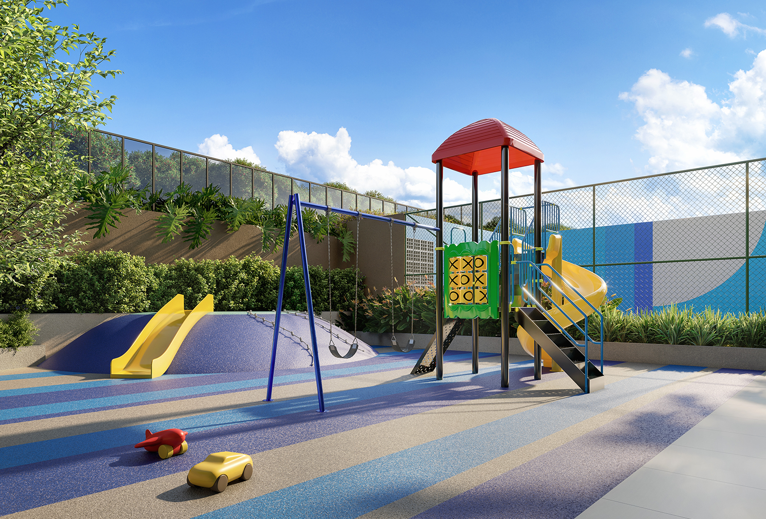 Área telada para lazer de crianças com piso emborrachado, escorregadores, balanço, brinquedos diversos e área verde .