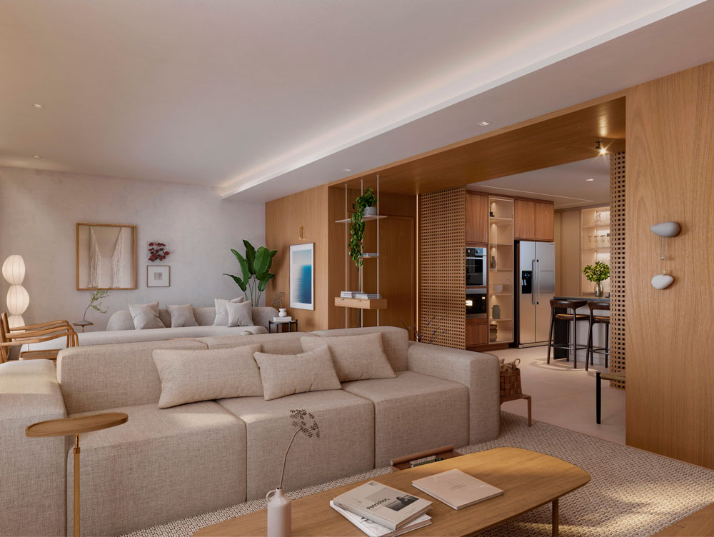Sala ampla e aconchegante, com sofá bege, mesa de madeira e cozinha gourmet integrada ao fundo.