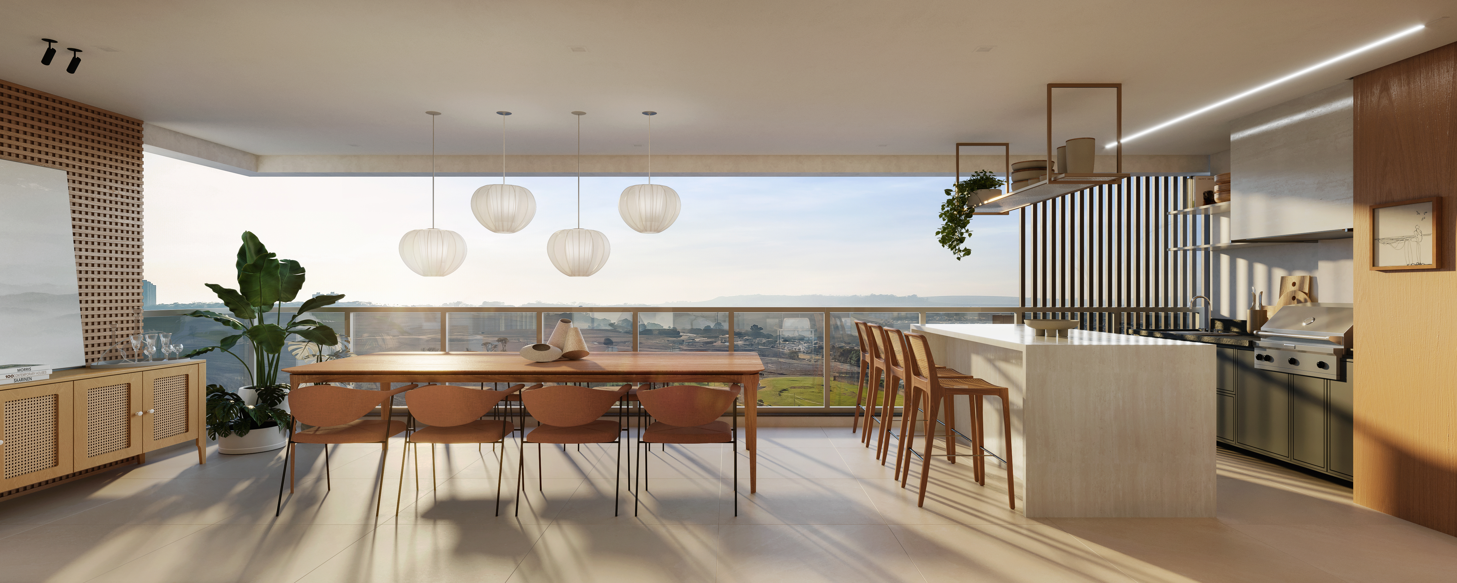 Varanda gourmet ampla, com mesa, bancada com banquetas, churrasqueira e vista aberta ao pôr do sol.