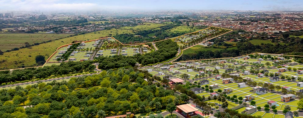 Visão aérea do bairro, apresentando a conexão entre as áreas dos residenciais e o verde abundante da natureza ao redor.