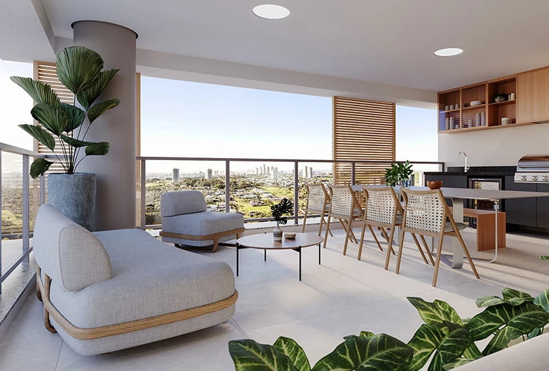  Varanda gourmet com poltronas, mesa, churrasqueira, plantas e vista panorâmica da cidade.
