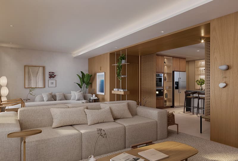 Sala ampla e integrada à cozinha, com sofás claros, acabamentos em madeira, plantas e iluminação natural.